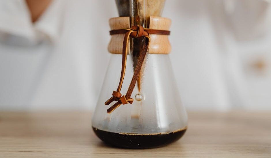 Close-up of a Chemex coffee maker with a reusable filter in use, highlighting sustainable brewing options for Chemex users.