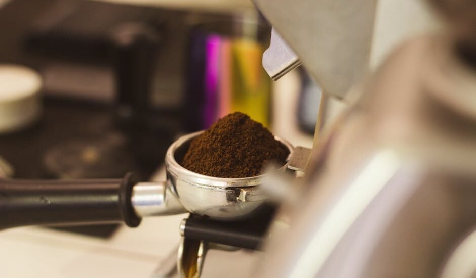 A portafilter filled with coffee grounds, illustrating a pressurized basket concept.