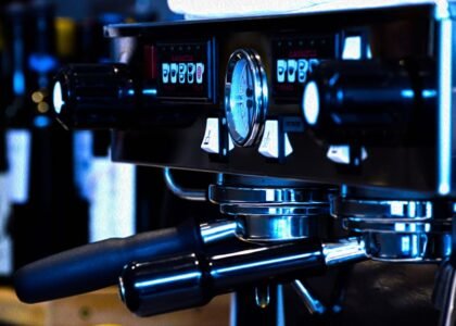 Close-up of an espresso machine’s pressure gauge and controls, illustrating how pressure settings impact espresso brewing.