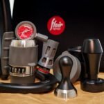 A collection of portable espresso maker parts, showcasing the article's focus on portable espresso makers.