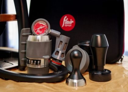 A collection of portable espresso maker parts, showcasing the article's focus on portable espresso makers.