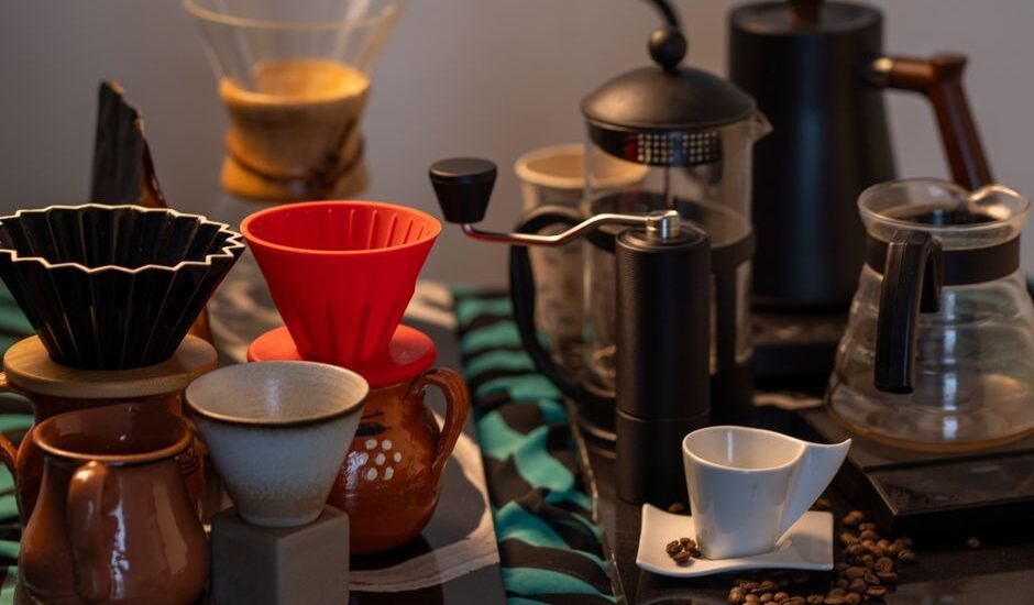 A variety of coffee brewing equipment illustrating percolation and immersion methods.