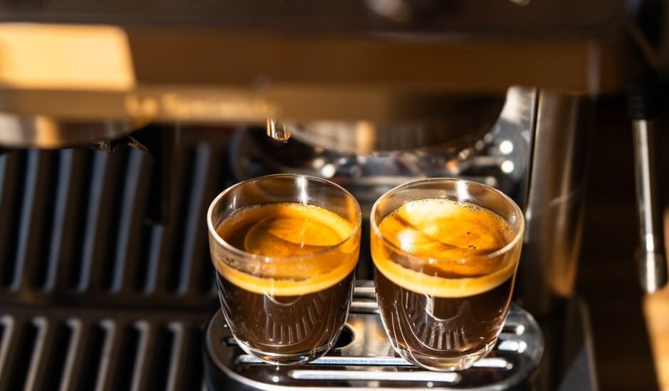 Two espresso shots in clear glasses, illustrating channeling in espresso extraction.