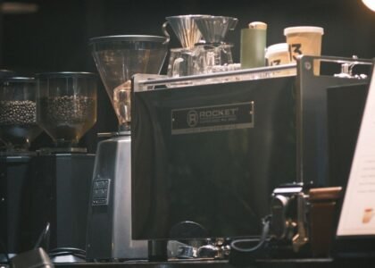 Espresso machine and grinders set up, illustrating when to start shot timer.