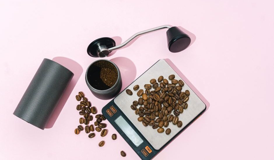 A coffee scale with whole beans and ground coffee, illustrating the cost of coffee scales.